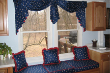 Blue Window Treatment and sitting area